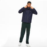 Mens Hooded Weather-Adaptable Windbreaker Jacket | Lacoste Navy Blue • Gsu