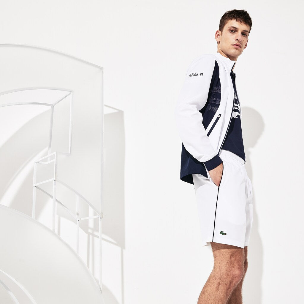 Mens   SPORT Novak Djokovic Stretch Technical Shorts | Lacoste White / Navy Blue • 522