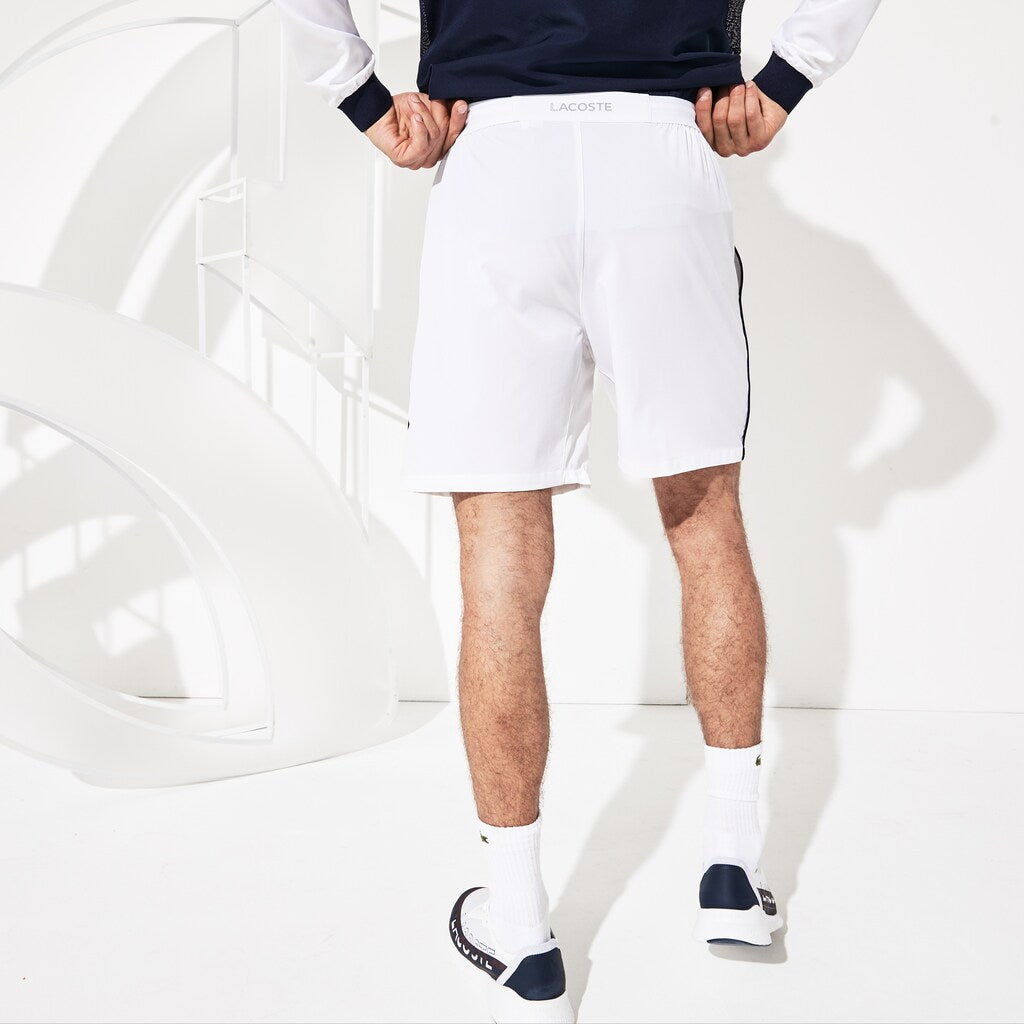 Mens   SPORT Novak Djokovic Stretch Technical Shorts | Lacoste White / Navy Blue • 522
