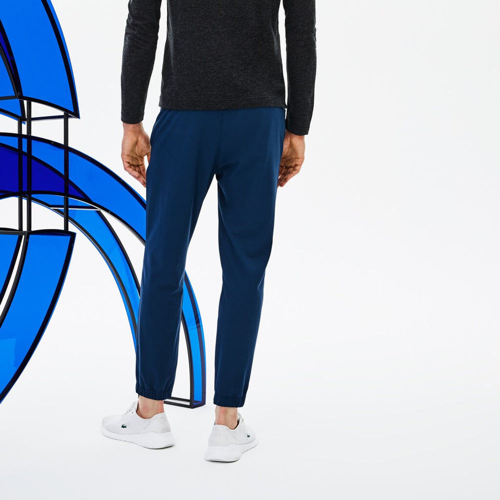 Mens   SPORT Novak Djokovic Stretch Technical Midlayer Trackpants | Lacoste Denim • Sua