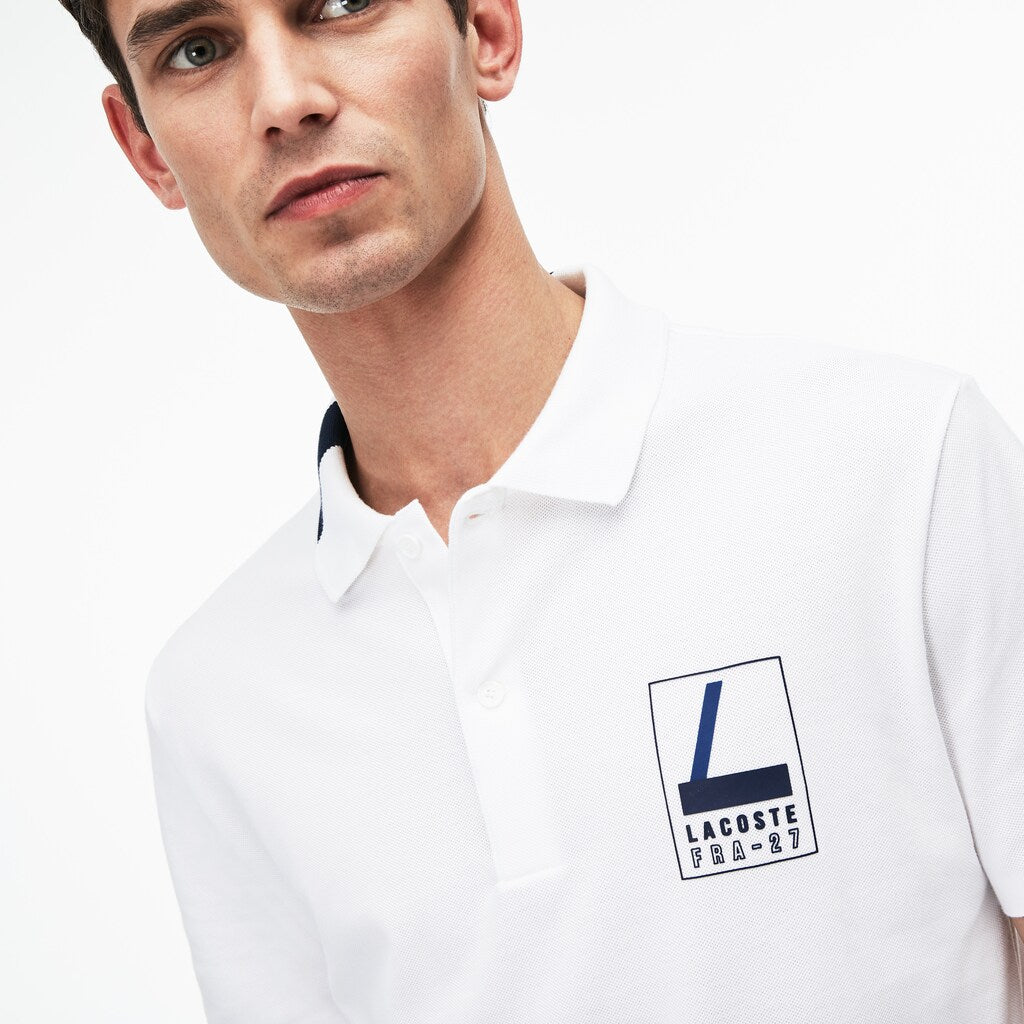 Mens   Slim Fit Lettering Stretch Mini Piqué Polo | Lacoste White / Navy Blue • 522