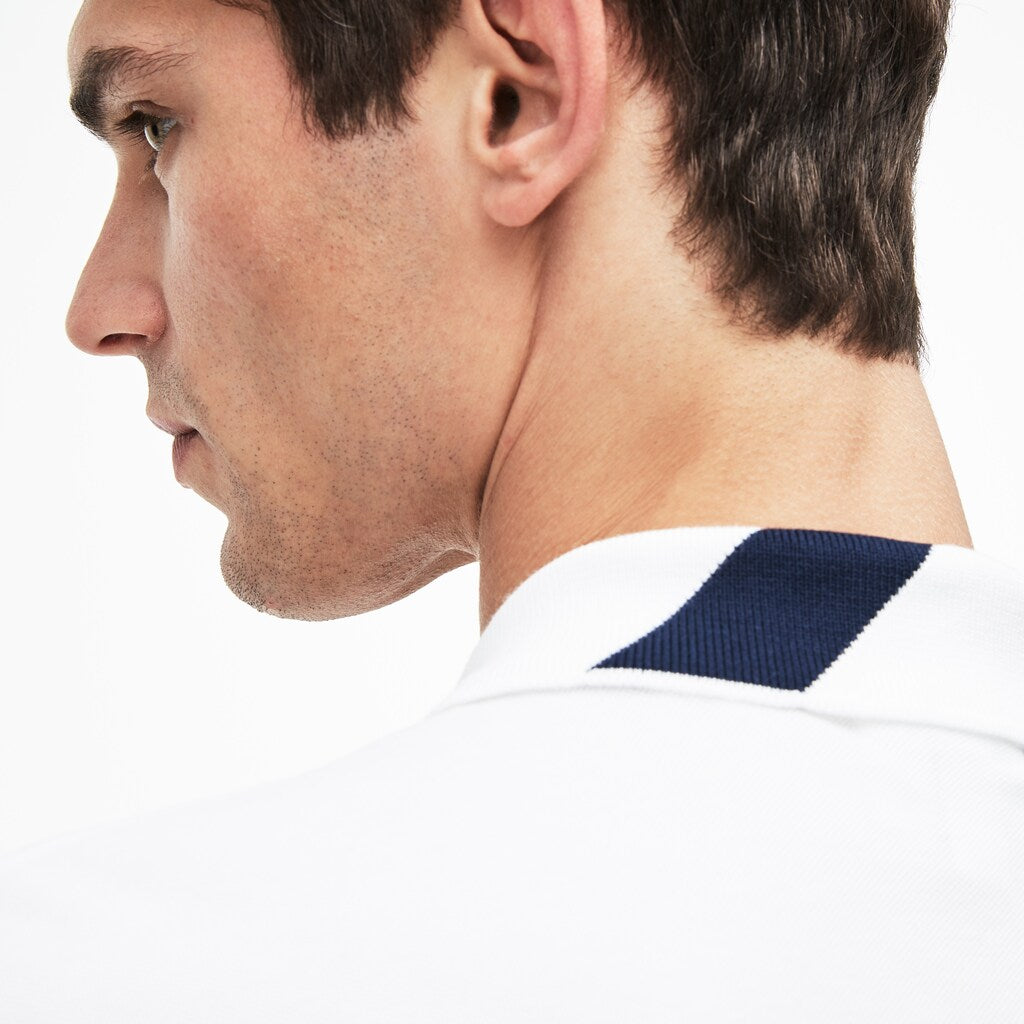 Mens   Slim Fit Lettering Stretch Mini Piqué Polo | Lacoste White / Navy Blue • 522