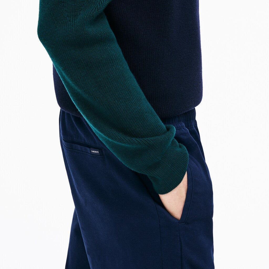 Mens   Slim Fit Elasticized Cotton Twill Chino Pants | Lacoste Navy Blue • 166