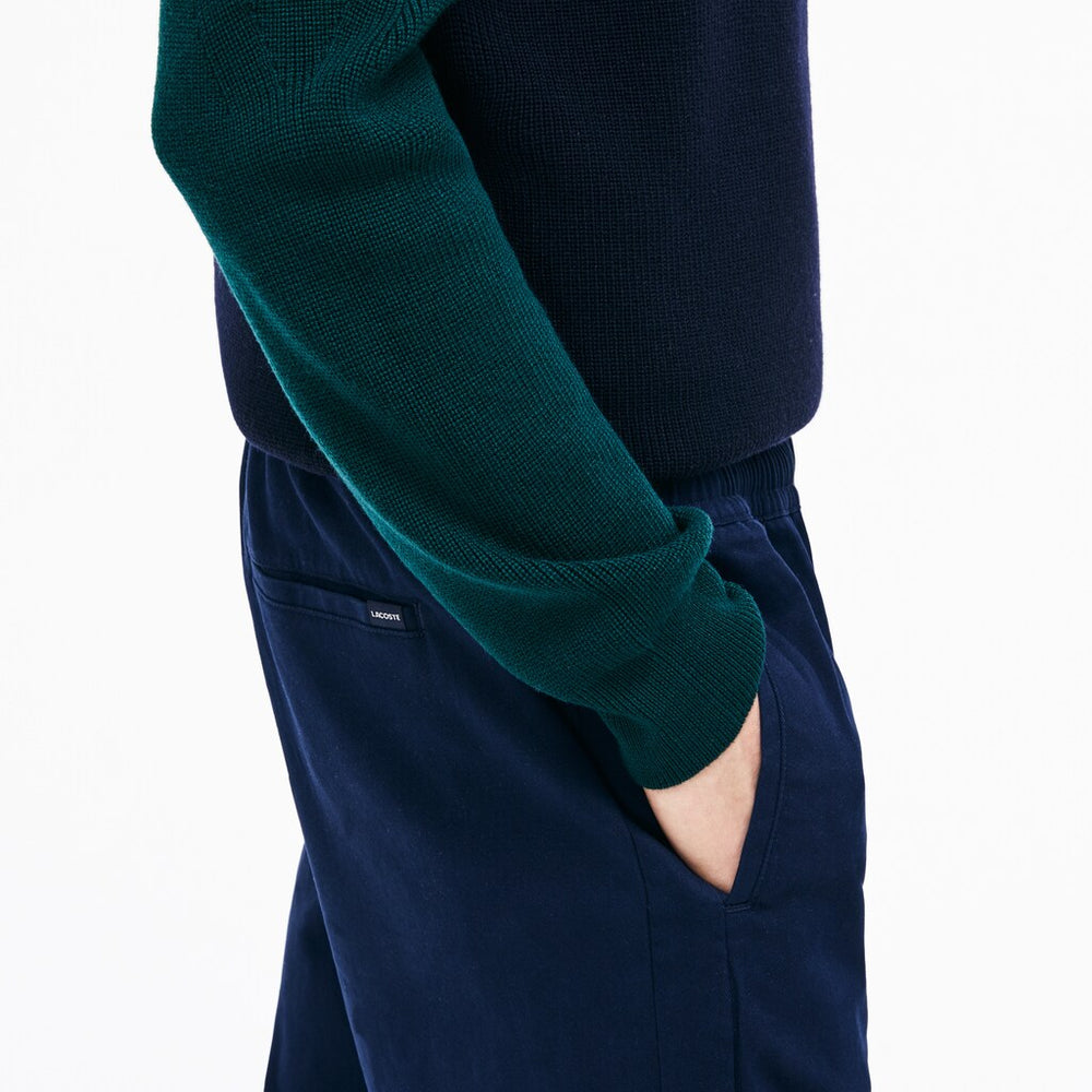 Mens   Slim Fit Elasticized Cotton Twill Chino Pants | Lacoste Navy Blue • 166