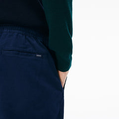 Mens   Slim Fit Elasticized Cotton Twill Chino Pants | Lacoste Navy Blue • 166