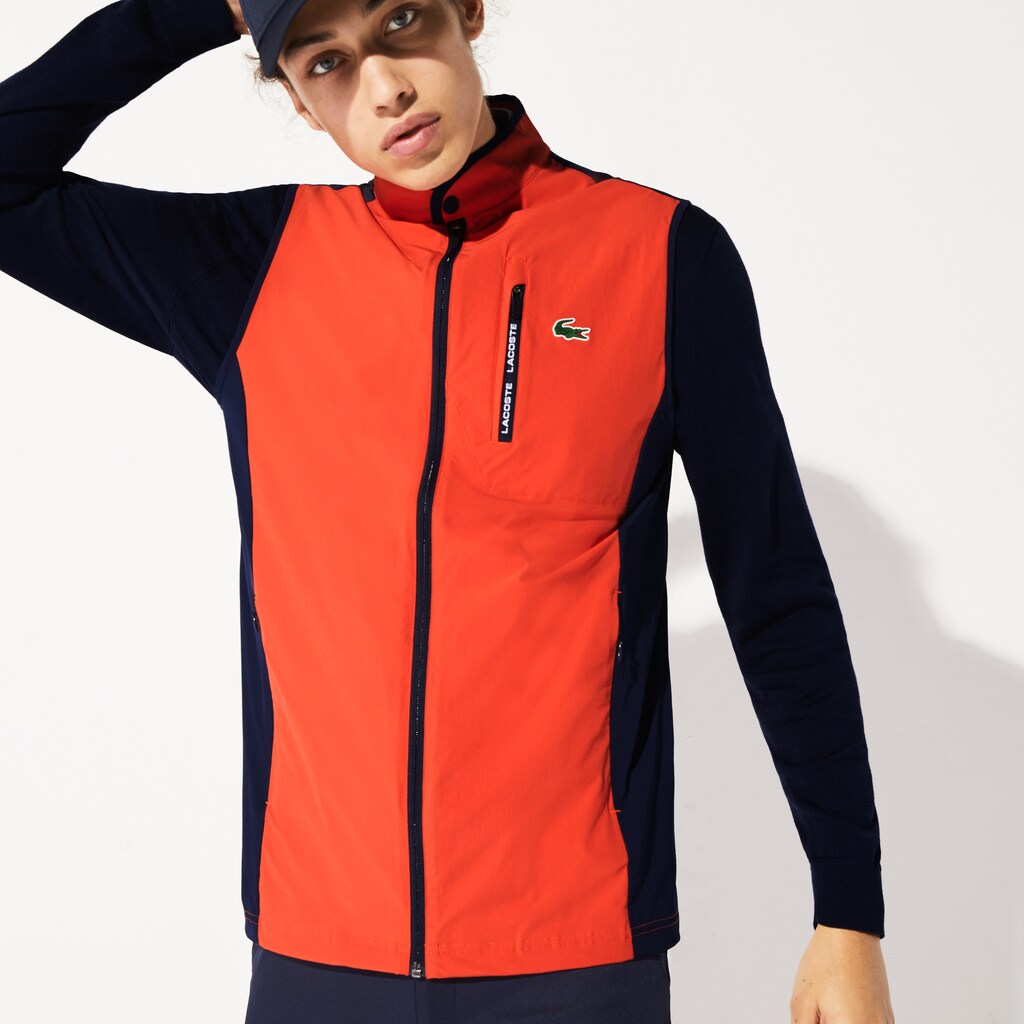 Mens   SPORT Lightweight Water-Resistant Golf Vest | Lacoste Red / Navy Blue • 145