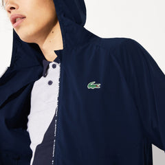 Mens   SPORT Water-Resistant Foldable Ultra-Light Zip Golf Jacket | Lacoste Navy Blue / Red • Xvf