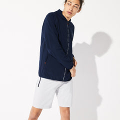 Mens   SPORT Water-Resistant Foldable Ultra-Light Zip Golf Jacket | Lacoste Navy Blue / Red • Xvf