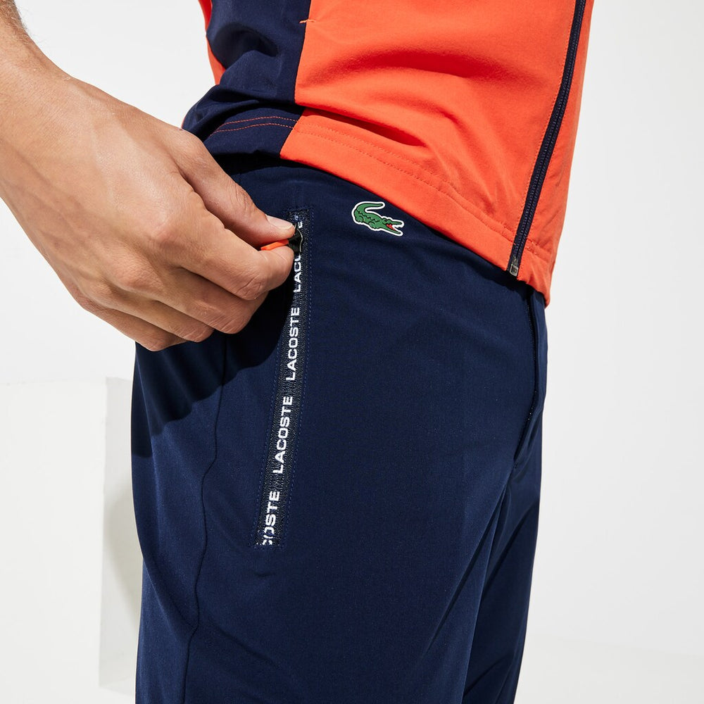 Mens   SPORT Stretch Golf Track Pants | Lacoste Navy Blue / White / Red • Xvv